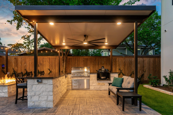 Custom stone patio and outdoor kitchen
